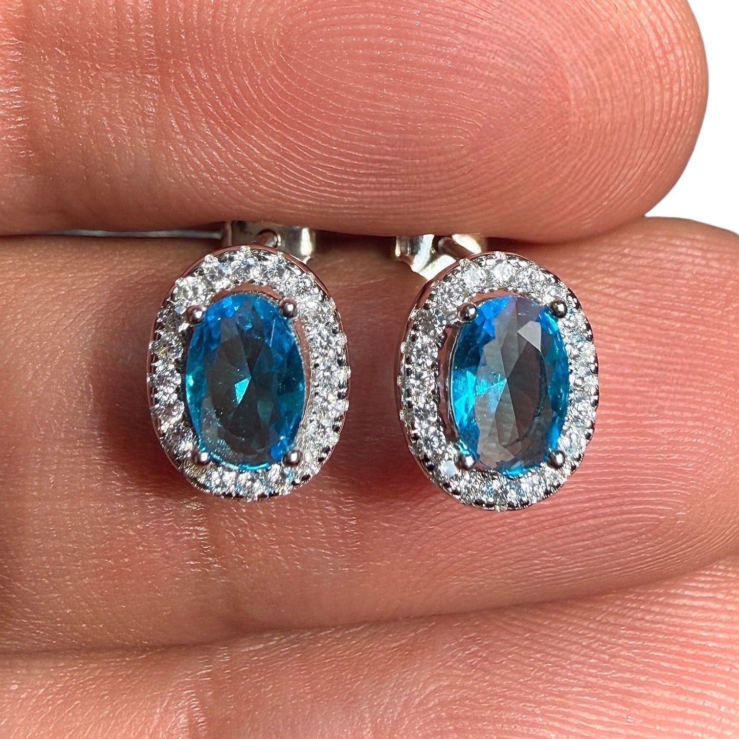 Blue Topaz CZ Stud Earrings in 925 Sterling Silver, 10x7mm Oval Halo